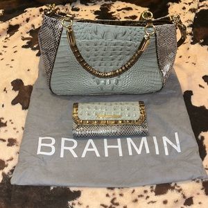 Brahmin two-tone sea green w/ snake print sides and handles. Top zipper close